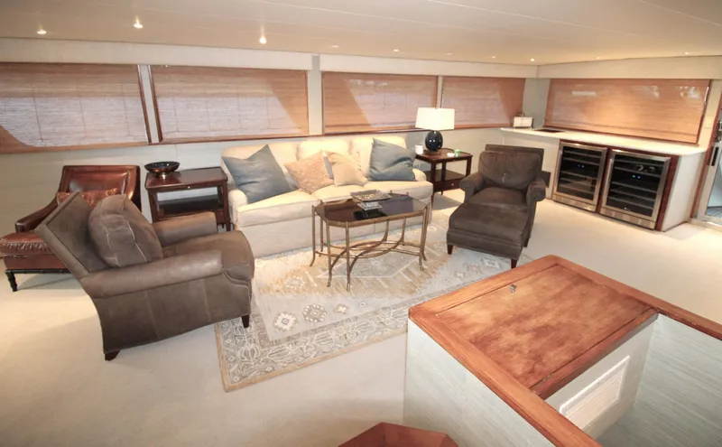 Freedom Yacht Photos Pics Luxurious 1979 Burger Raised Pilothouse yacht interior with elegant seating and modern decor.