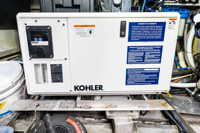 Godspeed Yacht Photos Pics Kohler generator in a Custom Kelly Archer 1998 boat engine room.