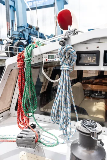 Godspeed Yacht Photos Pics Sailing yacht cockpit with ropes and winch, Custom Kelly Archer, 1998 model.