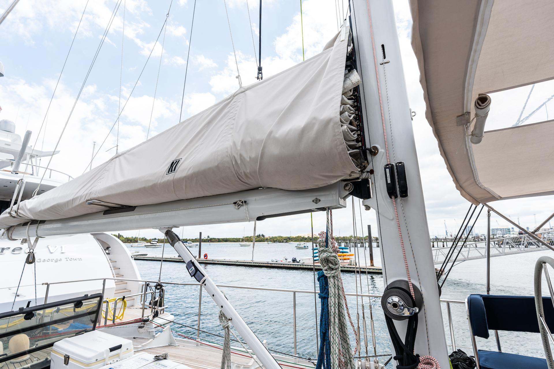 Sailboat deck view with mast and sail, Custom Kelly Archer 1998 model.
