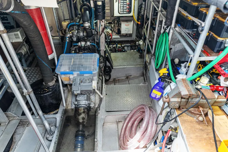 Godspeed Yacht Photos Pics Engine room of a 1998 Custom Kelly Archer boat, featuring equipment and storage.