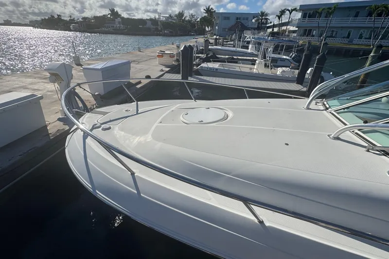  Yacht Photos Pics 2011 Hydra-Sports 3000 VX boat docked at marina, sunny day, calm waters.