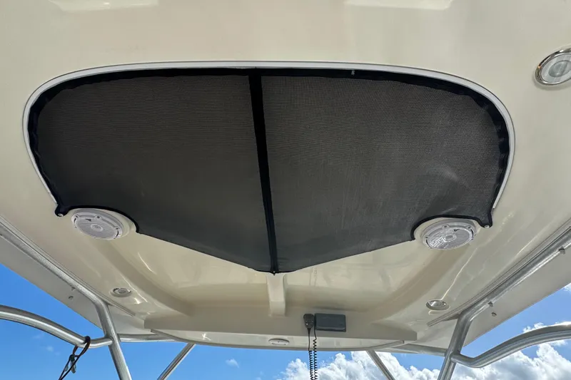  Yacht Photos Pics 2011 Hydra-Sports 3000 VX boat canopy with speakers and clear sky background.