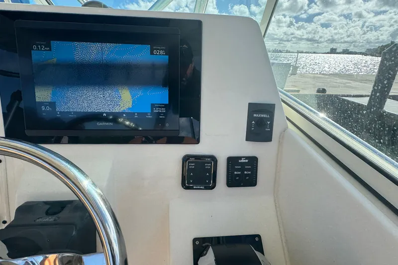  Yacht Photos Pics 2011 Hydra-Sports 3000 VX boat dashboard with Garmin navigation display.