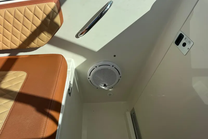  Yacht Photos Pics 2011 Hydra-Sports 3000 VX interior with tan leather seat and speaker detail.