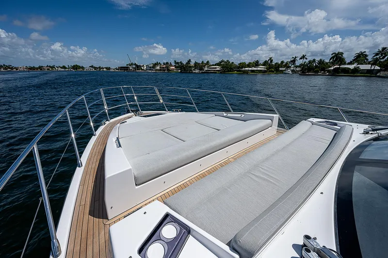  Yacht Photos Pics Luxurious 2022 Azimut S6 yacht with spacious sunbathing deck on calm waters.