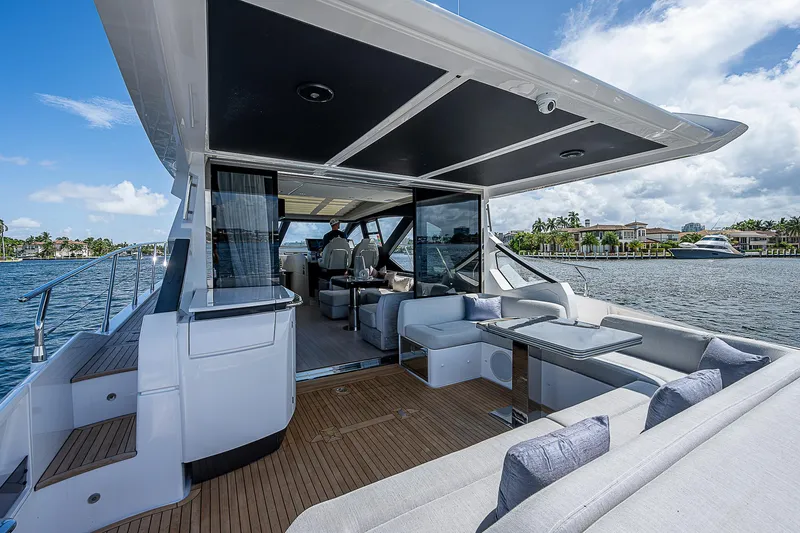  Yacht Photos Pics Luxurious 2022 Azimut S6 yacht with spacious deck and modern interior on a sunny day.