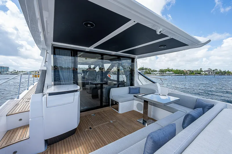 Yacht Photos Pics 2022 Azimut S6 yacht deck with modern seating and ocean view.