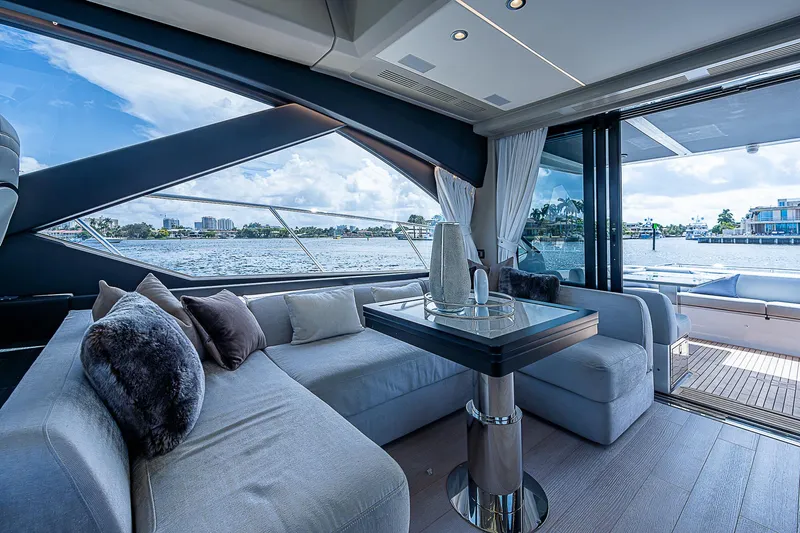  Yacht Photos Pics Luxurious interior of 2022 Azimut S6 yacht with elegant seating and waterfront view.