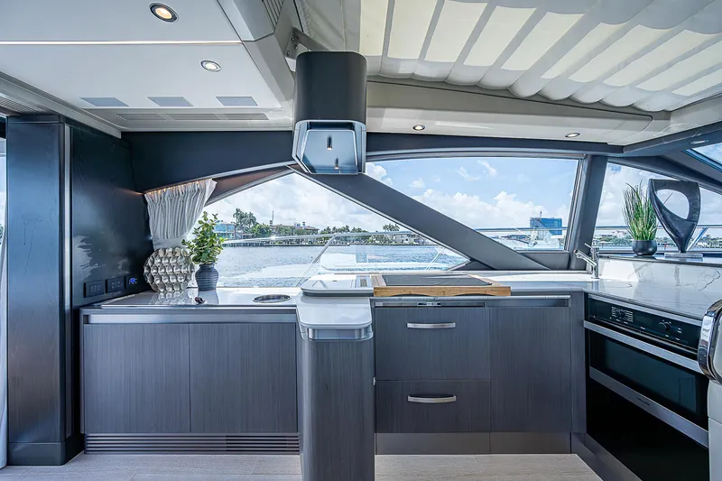  Yacht Photos Pics Luxurious interior of 2022 Azimut S6 yacht with modern kitchen design and ocean view.