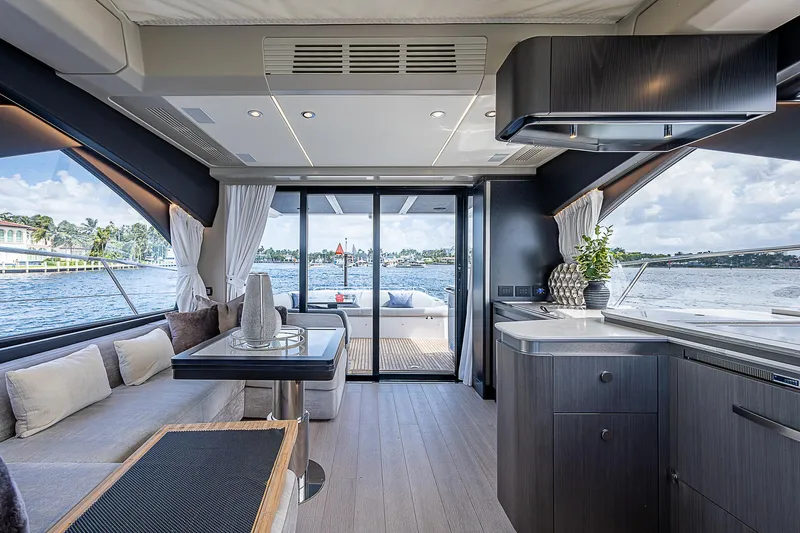  Yacht Photos Pics Luxurious interior of 2022 Azimut S6 yacht with modern kitchen and scenic water views.