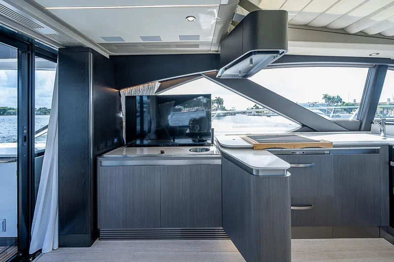  Yacht Photos Pics Luxurious interior of 2022 Azimut S6 yacht with modern kitchen and sleek design.