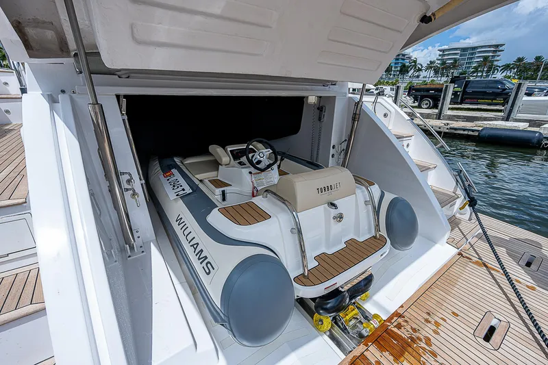  Yacht Photos Pics 2022 Azimut S6 yacht with Williams tender in storage compartment.