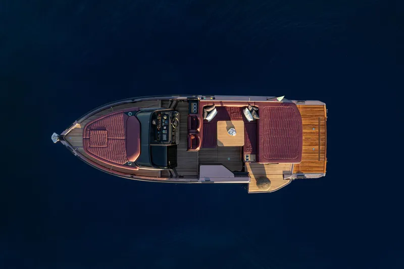  Yacht Photos Pics Overhead view of 2025 Cranchi A32 Luxury Tender on calm water.