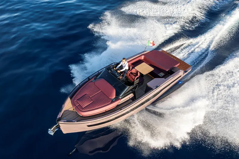  Yacht Photos Pics 2025 Cranchi A32 Luxury Tender cruising on open water, showcasing sleek design and elegance.