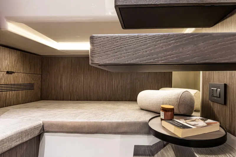  Yacht Photos Pics Interior of 2025 Cranchi A32 Luxury Tender, featuring modern design and cozy seating area.