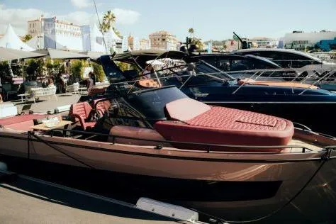  Yacht Photos Pics 2025 Cranchi A32 Luxury Tender yacht docked at marina, showcasing sleek design and modern features.