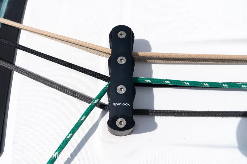 Queens Share Yacht Photos Pics Close-up of Spinlock rope clutch on 2008 Beneteau Oceanis 43 sailboat deck.