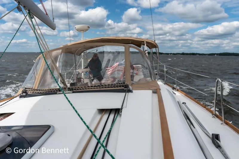Queens Share Yacht Photos Pics Sailing on a 2008 Beneteau Oceanis 43 under a cloudy sky.