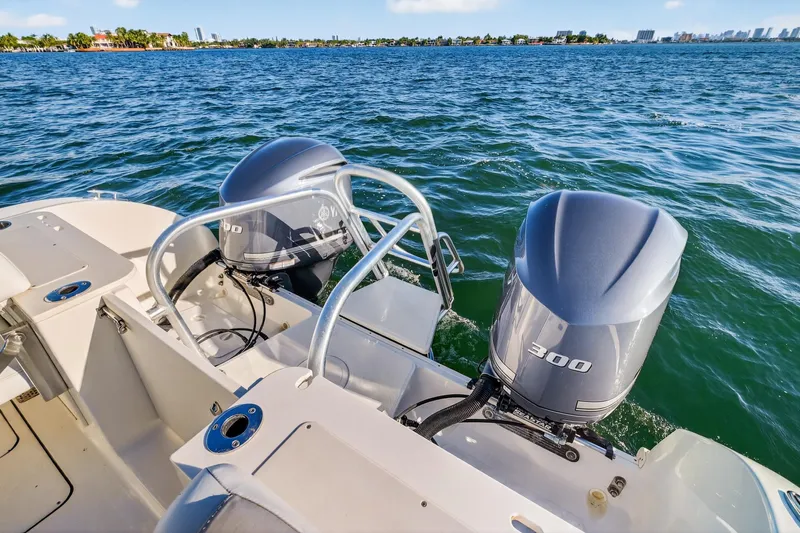  Yacht Photos Pics 2017 World Cat 295 DC boat with dual 300 horsepower engines on open water.