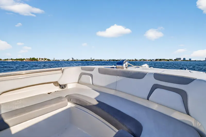  Yacht Photos Pics 2017 World Cat 295 DC boat interior with ocean view and clear blue sky.