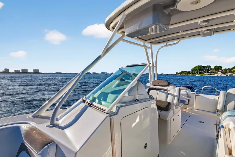  Yacht Photos Pics 2017 World Cat 295 DC boat interior with ocean view and clear blue sky.