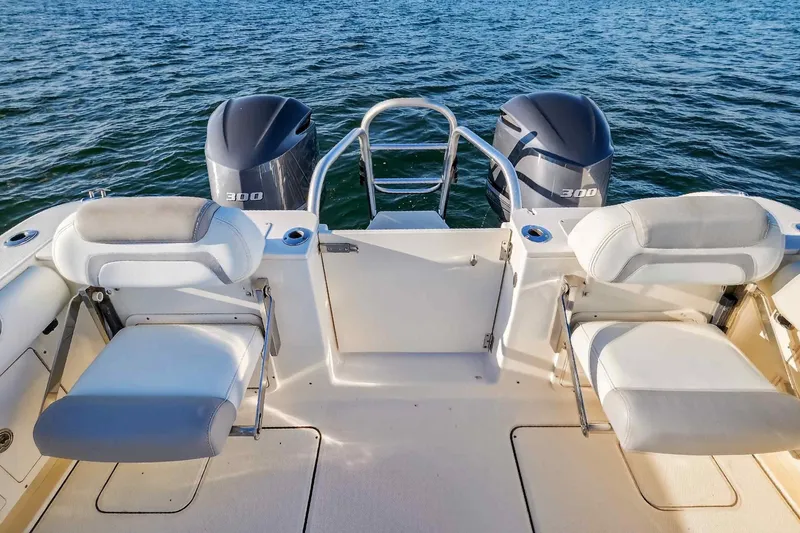  Yacht Photos Pics 2017 World Cat 295 DC boat with dual 300 horsepower engines on open water.