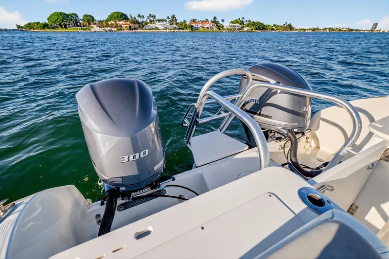  Yacht Photos Pics 2017 World Cat 295 DC boat with twin 300 horsepower Yamaha outboard engines on the water.