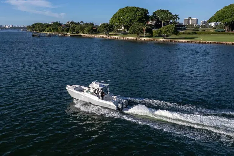  Yacht Photos Pics 2017 World Cat 295 DC cruising on a scenic waterway.