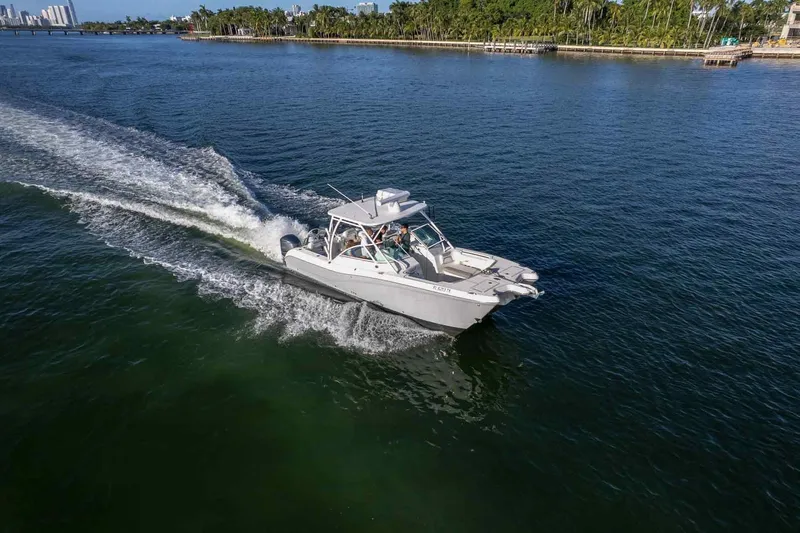  Yacht Photos Pics 2017 World Cat 295 DC cruising on a scenic waterway.