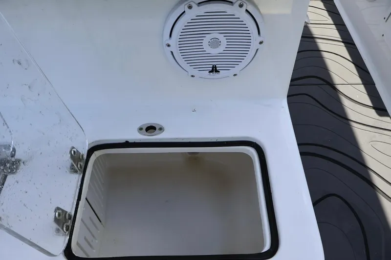  Yacht Photos Pics Open storage compartment on 2022 Sea Hunt Gamefish 30 Coffin Box boat with speaker.