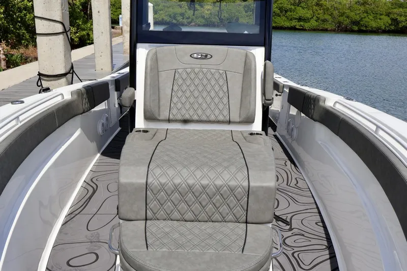  Yacht Photos Pics 2022 Sea Hunt Gamefish 30 Coffin Box boat interior with cushioned seating and stylish design.