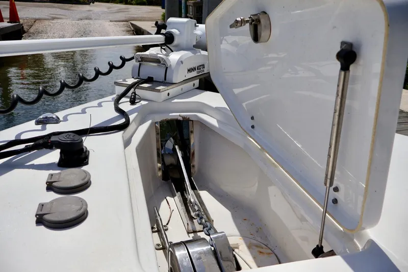  Yacht Photos Pics 2022 Sea Hunt Gamefish 30 Coffin Box with Minn Kota trolling motor, open storage compartment.