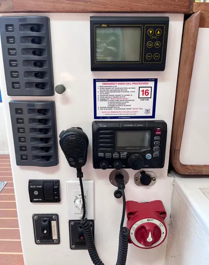 Yippee Kai Yay Yacht Photos Pics Control panel of a 2009 Class 40 Antrim Design boat with radio and switches.