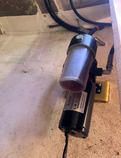 Yippee Kai Yay Yacht Photos Pics Hydraulic pump system in Class 40 Antrim Design, 2009 model, mounted on a wall.