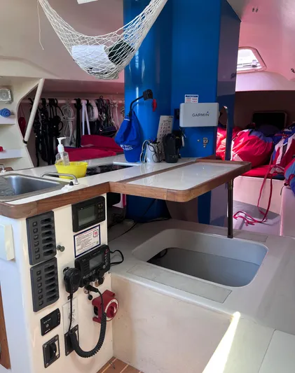 Yippee Kai Yay Yacht Photos Pics Interior of 2009 Class 40 Antrim Design yacht with navigation equipment and storage.