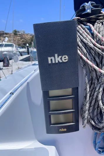 Yippee Kai Yay Yacht Photos Pics Sailing instrument panel on Class 40 Antrim Design yacht, 2009, with ropes and clear sky.