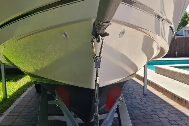 The Snapper Slapper Yacht Photos Pics 2014 Boston Whaler 315 Conquest Pilothouse on trailer, close-up view of bow.
