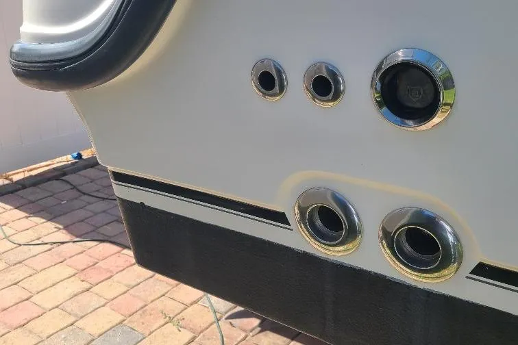 The Snapper Slapper Yacht Photos Pics 2014 Boston Whaler 315 Conquest Pilothouse boat hull with chrome fittings.