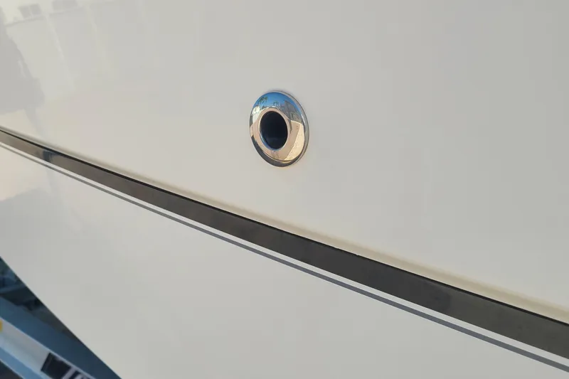 The Snapper Slapper Yacht Photos Pics Close-up of 2014 Boston Whaler 315 Conquest Pilothouse hull detail.