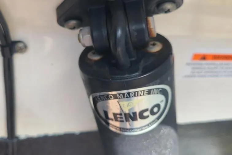 The Snapper Slapper Yacht Photos Pics Close-up of a Lenco Marine component on a 2014 Boston Whaler 315 Conquest Pilothouse.