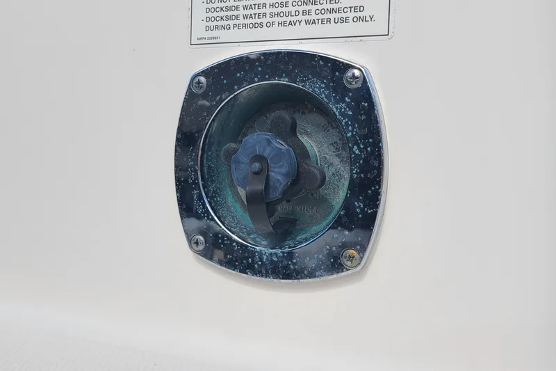 The Snapper Slapper Yacht Photos Pics Water inlet on 2014 Boston Whaler 315 Conquest Pilothouse boat.