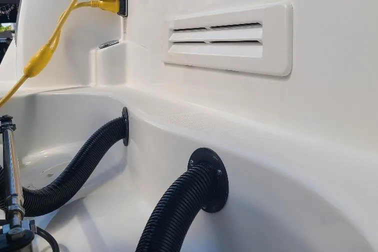 The Snapper Slapper Yacht Photos Pics 2014 Boston Whaler 315 Conquest Pilothouse interior detail with cables and vent.