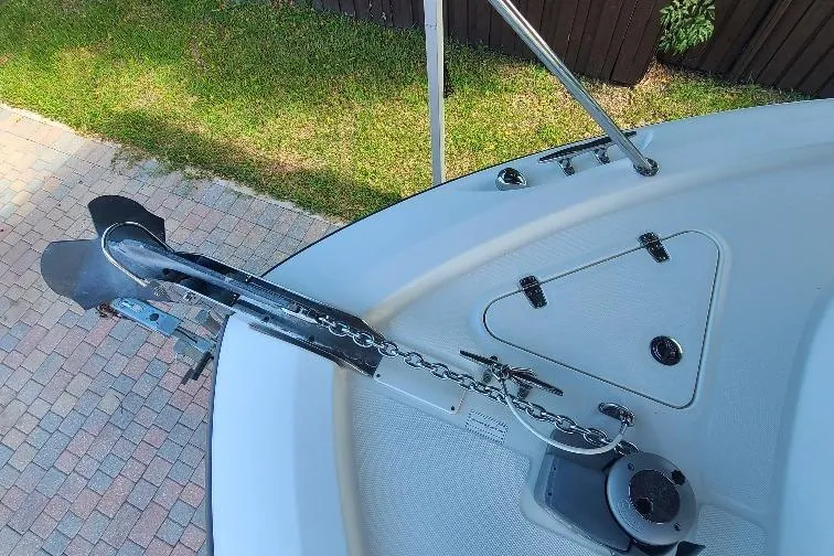 The Snapper Slapper Yacht Photos Pics 2014 Boston Whaler 315 Conquest Pilothouse anchor system on deck, with chain and winch.