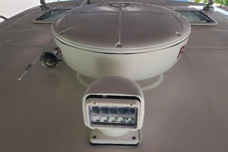 The Snapper Slapper Yacht Photos Pics 2014 Boston Whaler 315 Conquest Pilothouse radar and light on deck.