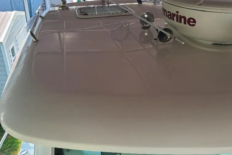 The Snapper Slapper Yacht Photos Pics 2014 Boston Whaler 315 Conquest Pilothouse roof with marine equipment.