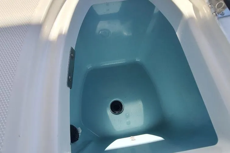 The Snapper Slapper Yacht Photos Pics Livewell on 2014 Boston Whaler 315 Conquest Pilothouse boat, filled with water.