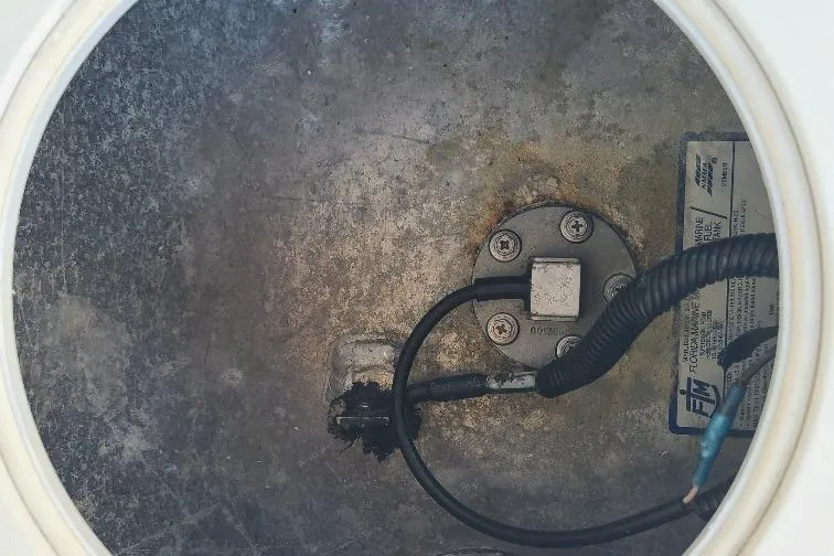 The Snapper Slapper Yacht Photos Pics Fuel tank access panel of 2014 Boston Whaler 315 Conquest Pilothouse boat.