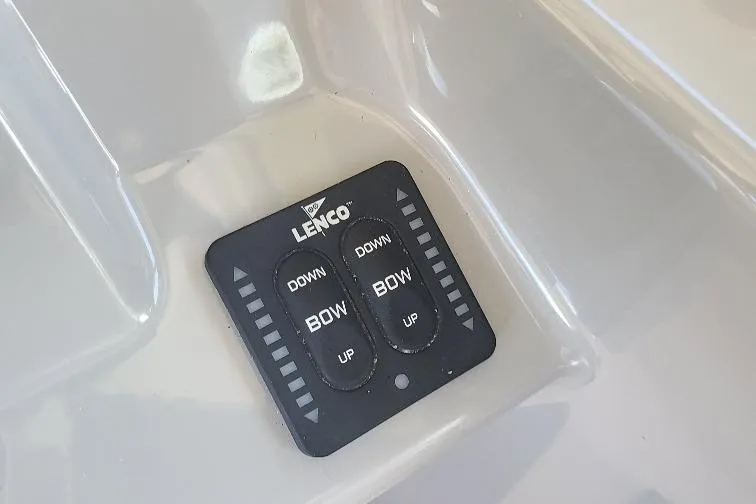 The Snapper Slapper Yacht Photos Pics Lenco trim tab control panel on 2014 Boston Whaler 315 Conquest Pilothouse boat.