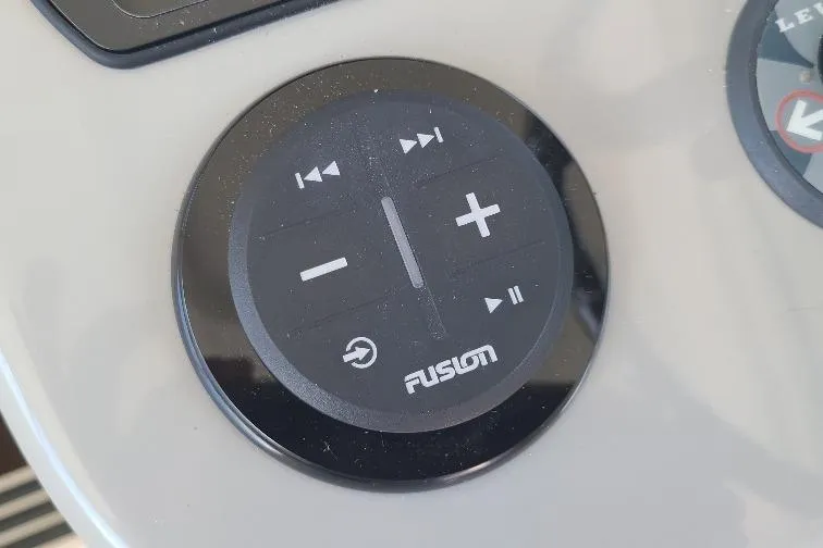 The Snapper Slapper Yacht Photos Pics Fusion audio control panel on 2014 Boston Whaler 315 Conquest Pilothouse.